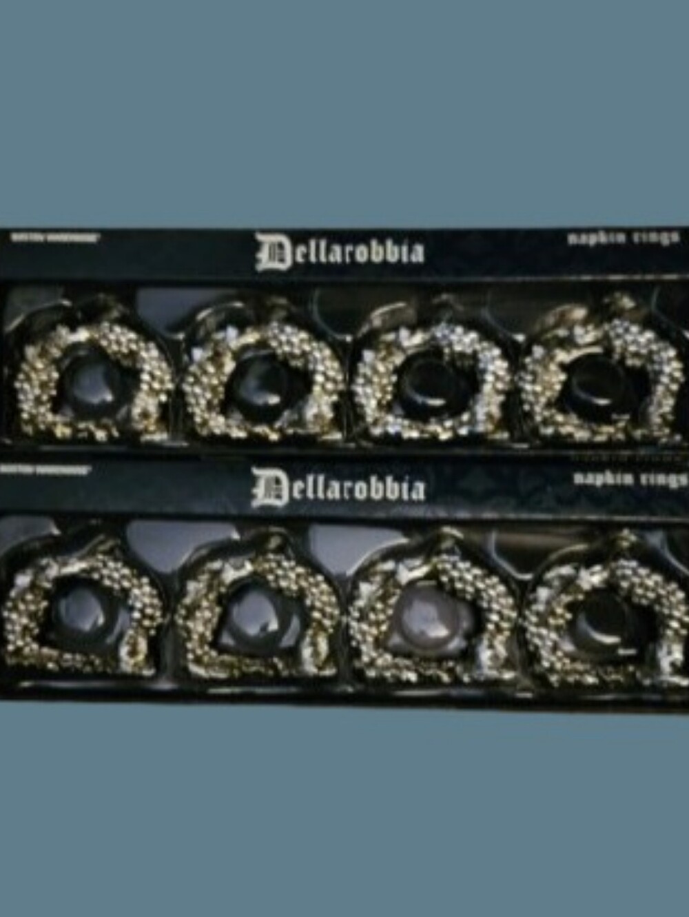 Boston Warehouse Dellarobbia napkin rings featuring a grape and leaf motif.